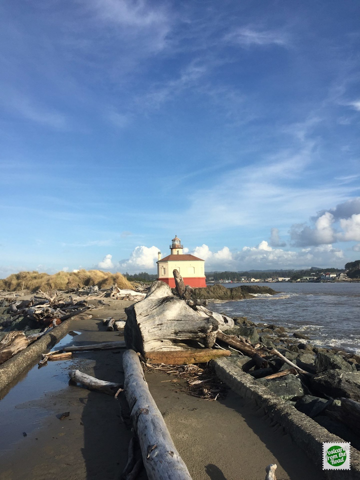 The historic Coquille Lighthouse as seen from the beginning of the jetty.